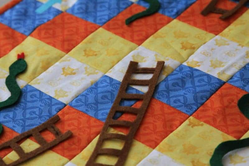 how-to-sew-a-quilted-snakes-and-ladders-playmat-threadistry