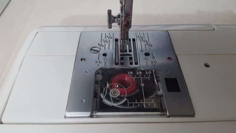 Use the guides on your sewing machine foot plate to sew straighter.