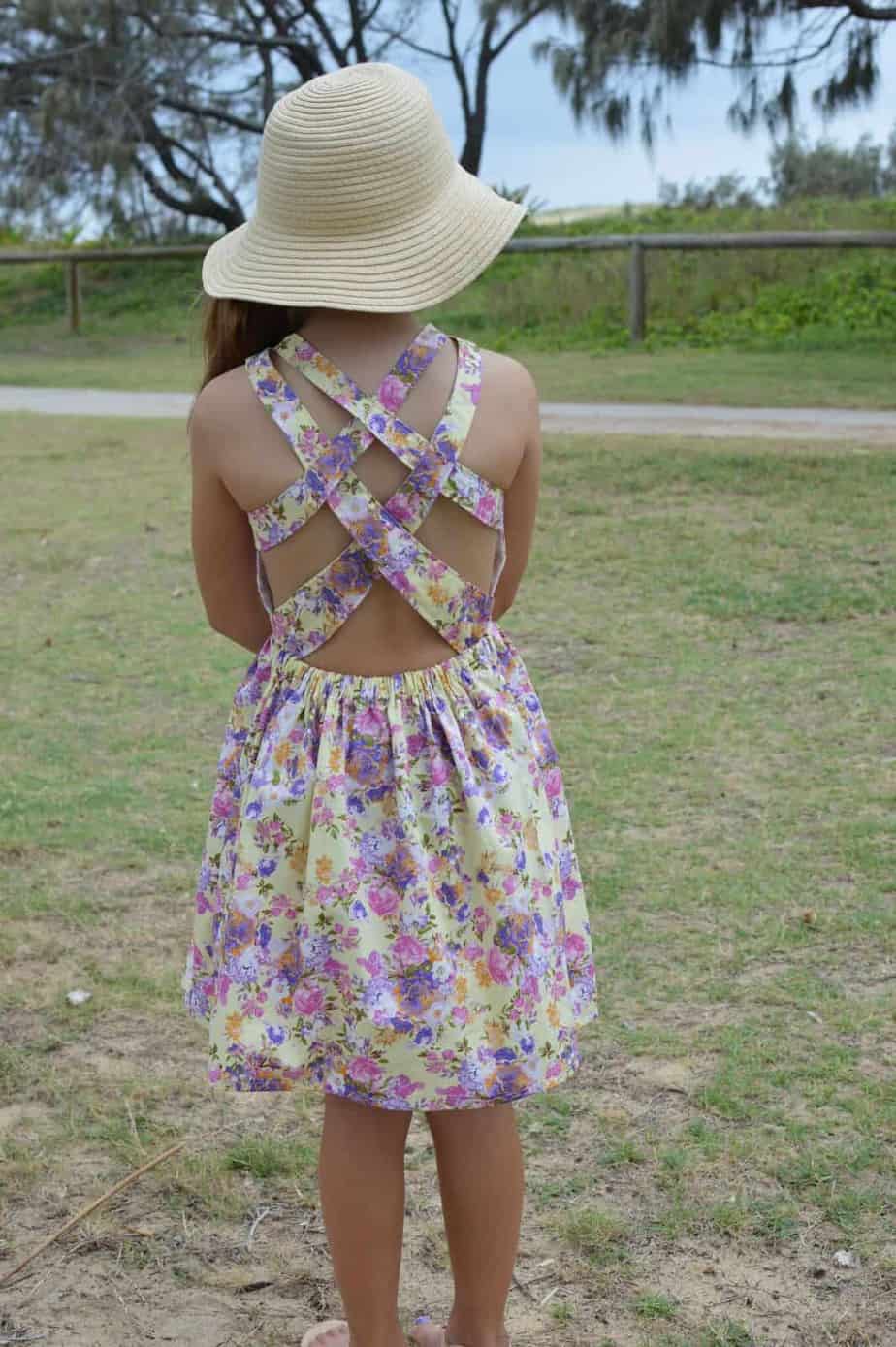 Summer dress sewing pattern for girls with strappy back from Bubby and Me Creations.