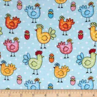 Flannel fabric with chickens, roosters and eggs on it - perfect for snuggly pajamas or cuddly blankets.