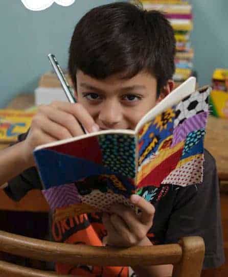 Boy with a handmade journal cover