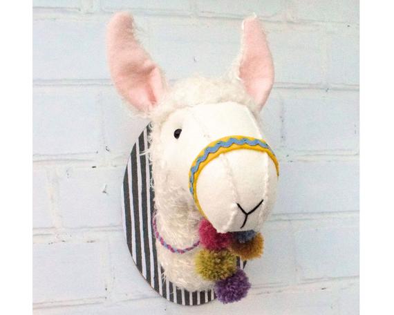 The llama trophy head sewing pattern is a fun idea for a wall-hanging for the lover of llamas (with no animals getting hurt in the process!)