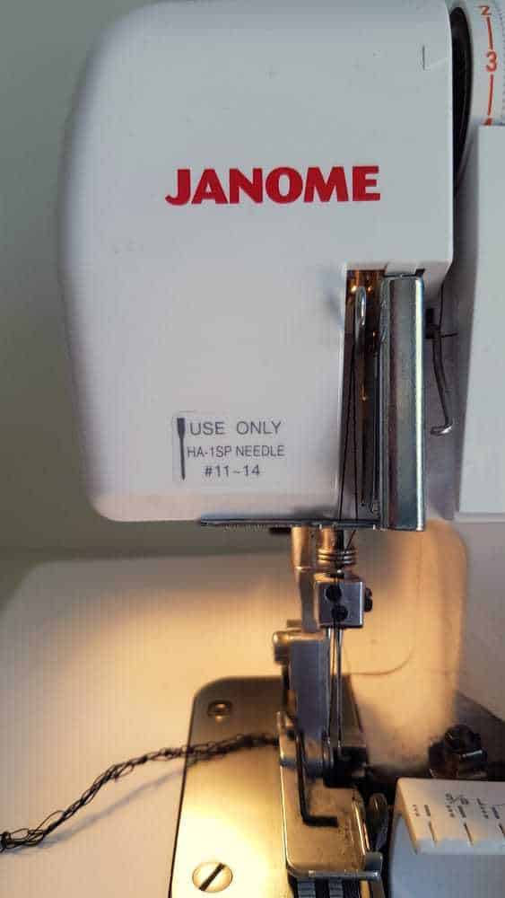 Serger with needle information on label