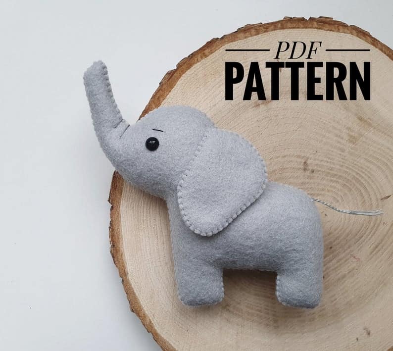 Felt elephant sewing pattern with trunk up in the air