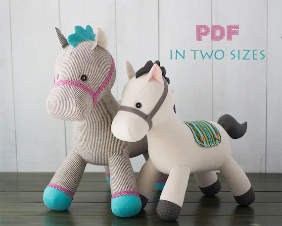 Two stuffed pony toys