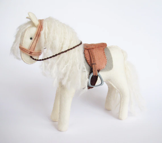 Felt horse with saddle and bridle
