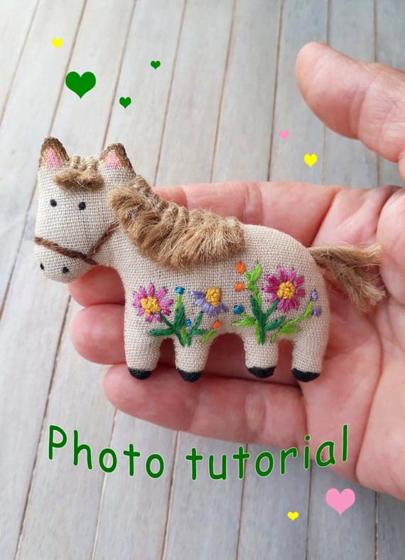 Small embroidered horse with flowers