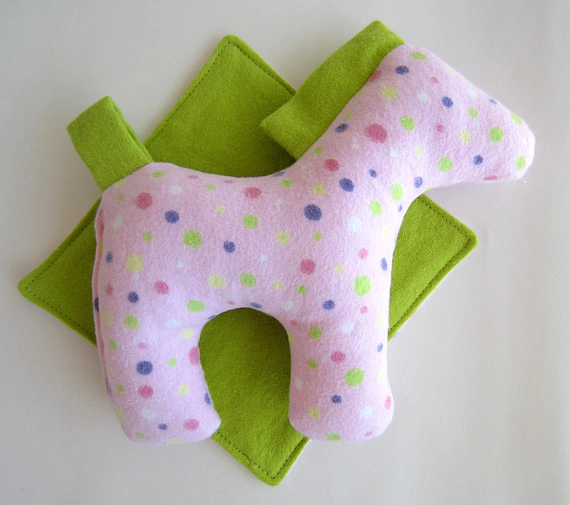 Simple horse plushie on small blanket