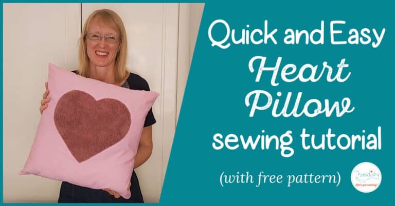 Woman holding a pink pillow with a heart with text overlay "Quick and Easy Heart Pillow sewing tutorial (with free pattern)"
