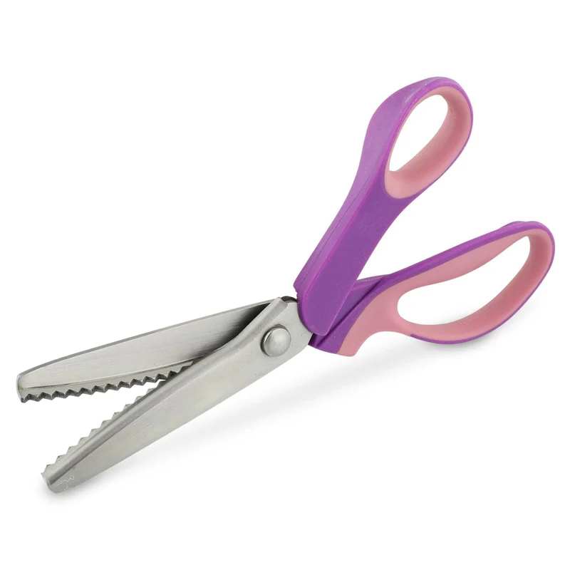 Pink and purple pinking shears, wtih blades open, on a white background