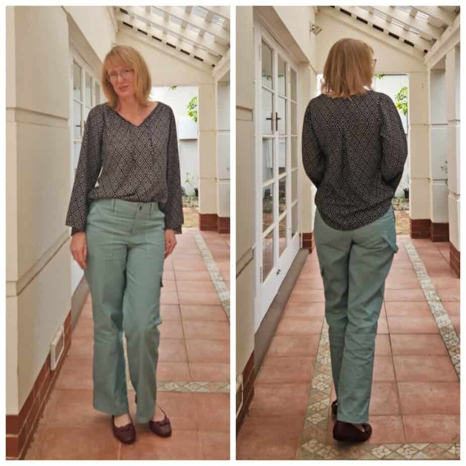 Threadistry, woman modeling stylish top and trousers, indoor setting, casual fashion look.