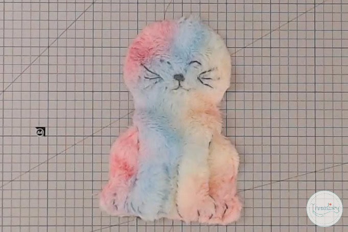 Colorful embroidered kitten patch, perfect for clothing or accessories, handmade with soft plush thread.