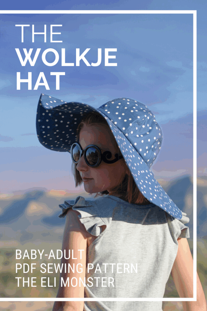 Blue polka dot sun hat for women and girls, stylish sun protection accessory.