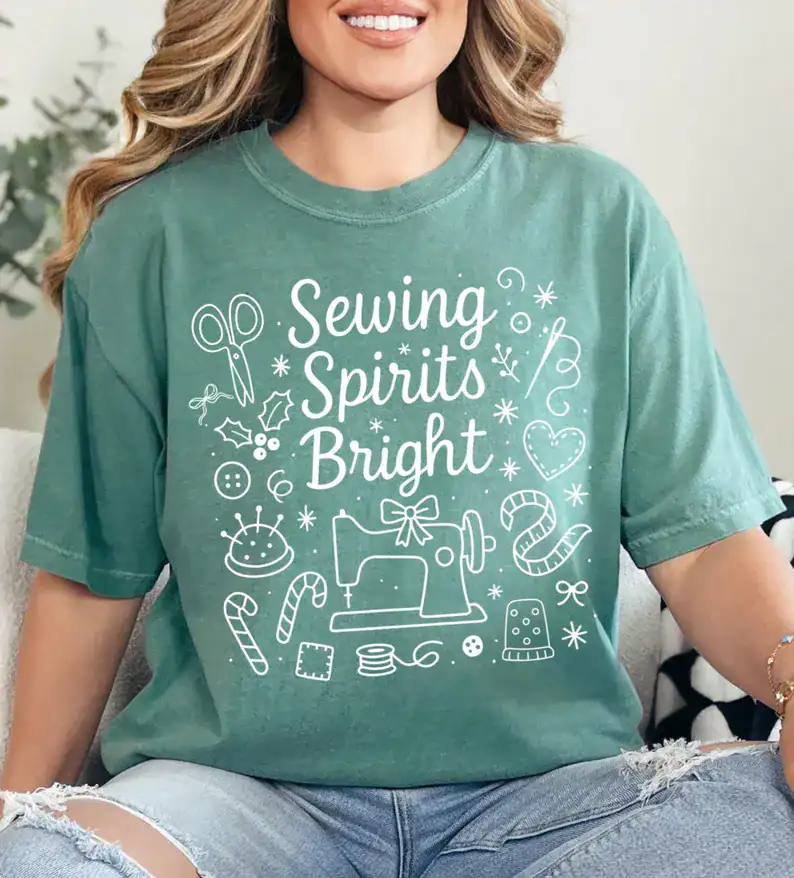 Sewing spirits bright t-shirt with embroidery design, perfect for sewing enthusiasts and holiday gifting.