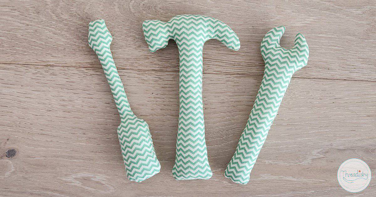 Baby tool set made of fabric with chevron pattern, perfect for sewing projects.