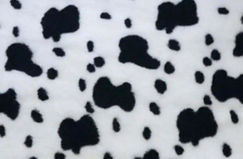 Cow print fabric pattern for plush cow sewing projects.