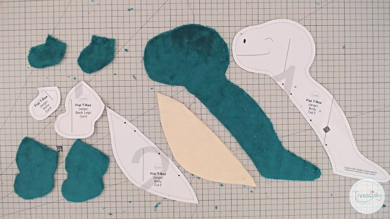 DIY dinosaur plush toy sewing pattern for kids and crafters.