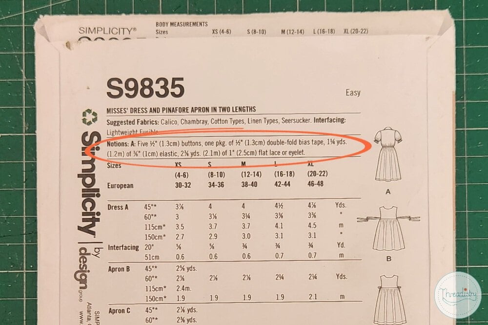 Simplicity sewing pattern envelope for Misses' dress and apron.
